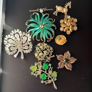 Vintage Brooch Collection with Green and Gold Accents